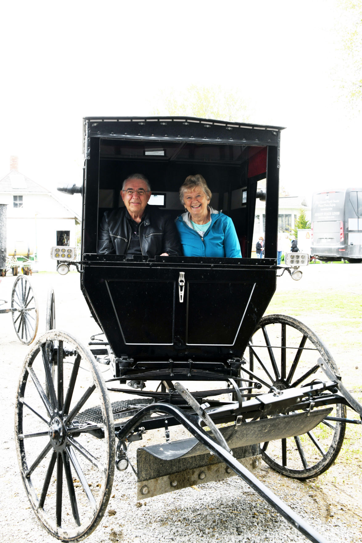 124 Leo and Sylvia Epp in an Amish buggy.JPG
